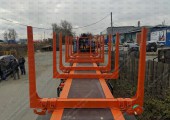 Полуприцеп лесовозный 3-х осный высокорамный